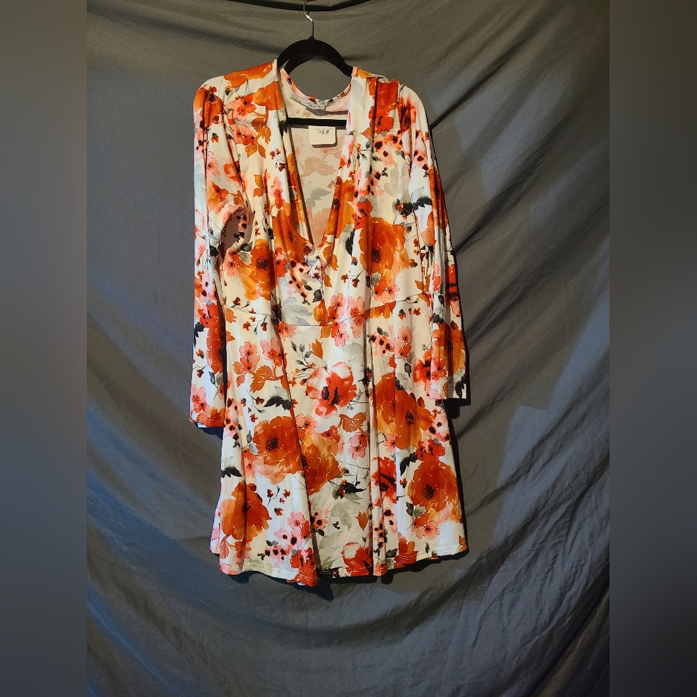Dress that's a romper. With tags never worn from a boutique